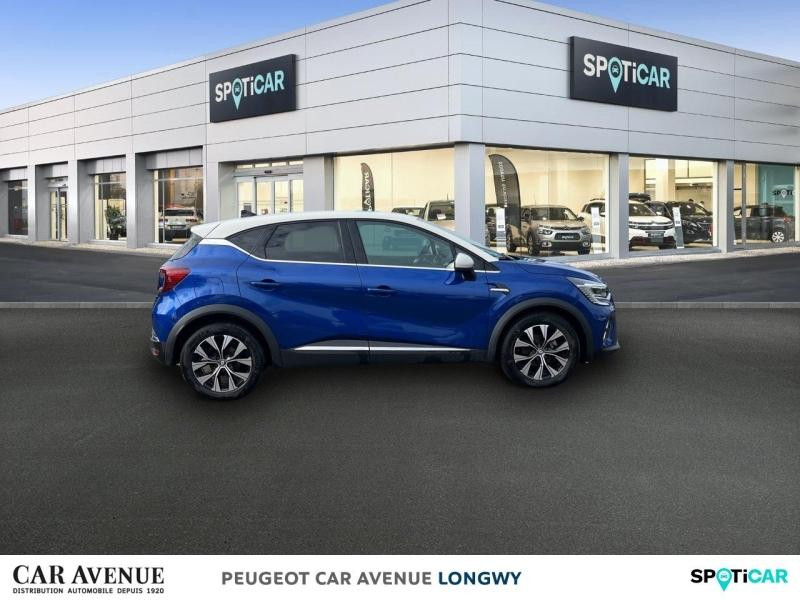 Occasion RENAULT Captur 1.6 E-Tech hybride 145ch Techno 2023 Bleu Iron/Blanc Albatre 21390 € à Longwy