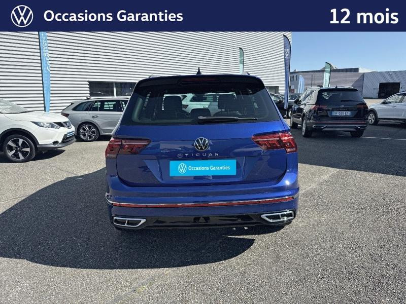 Occasion VOLKSWAGEN Tiguan 2.0 TDI 150 R-Line DSG7 / Amortisseurs DCC / Caméra 360 / Jantes 20  SUZUKA / Feux Matrix LED 2022 Bleu Lapiz métallisée 30989 € à Haguenau